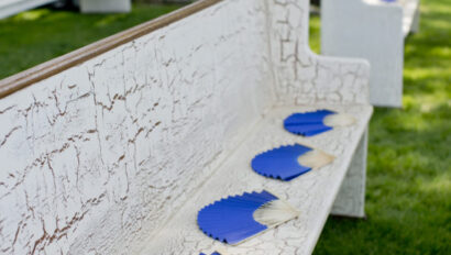 white bench with fans on it