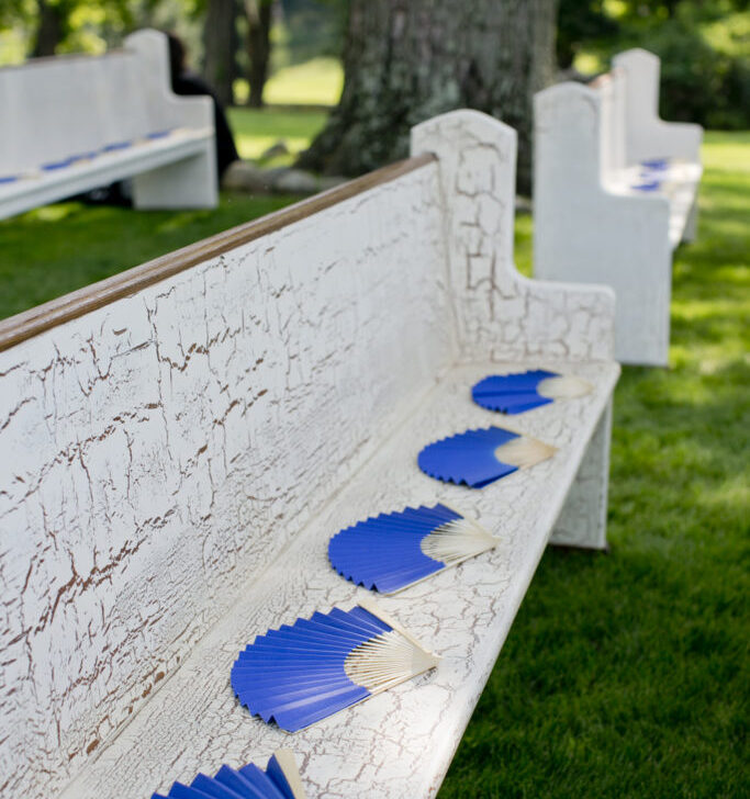 white bench with fans on it