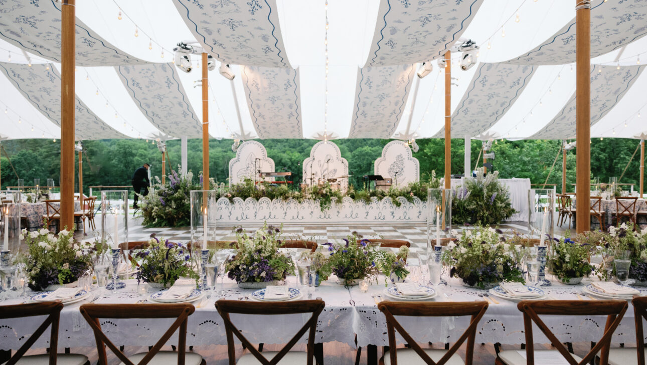Beautiful Vermont destination wedding reception designed by Rafanelli Events. Elegant white with blue, wildflowers and custom checkerboard dance floor.