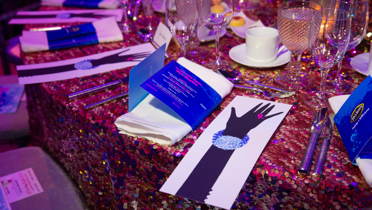 program at a party table setting for bcrf.
