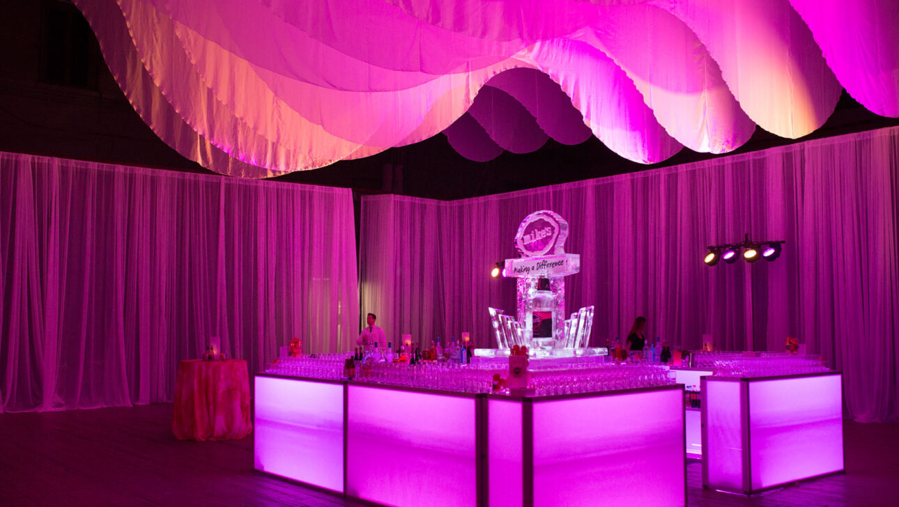 pink bar with an ice sculpture behind.