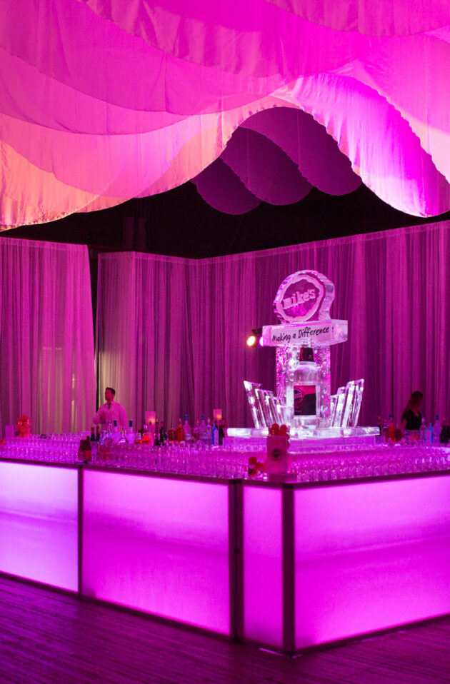pink bar with an ice sculpture behind.