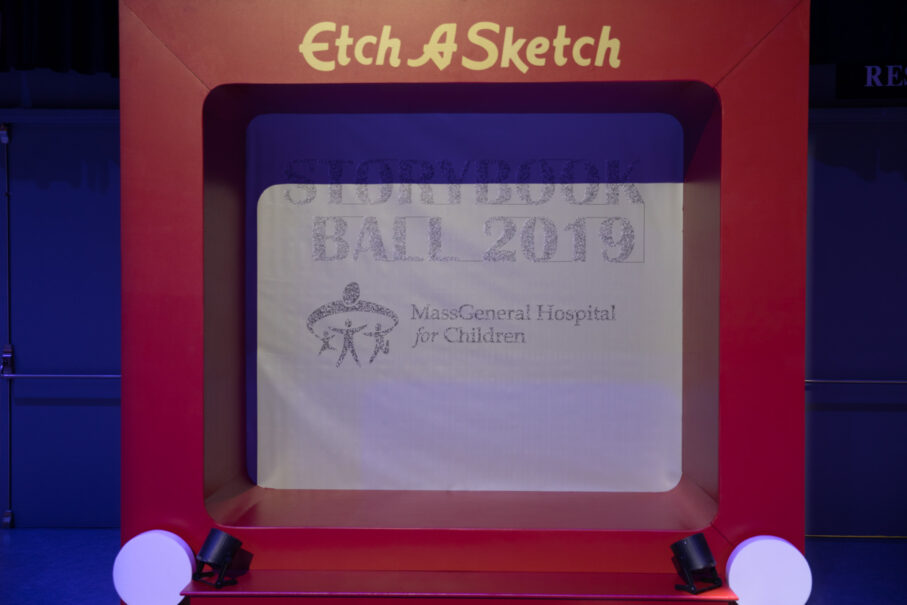 Large Etch A Sketch display featuring text "Storybook Ball 2019 - MassGeneral Hospital for Children," designed by a leading event planning company.