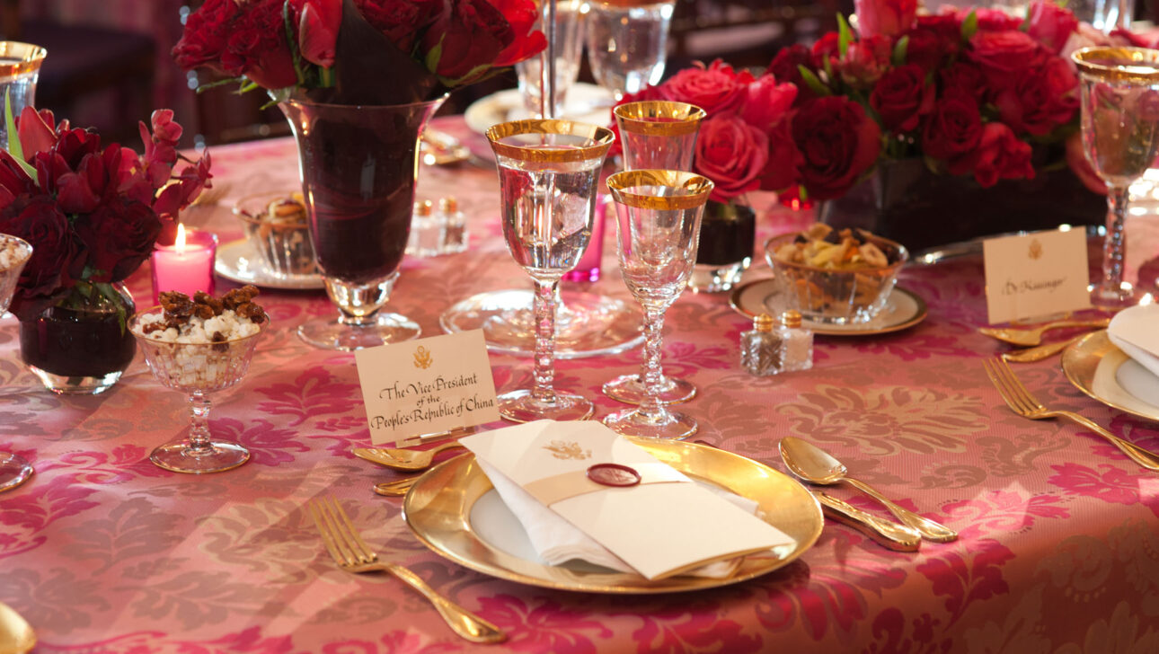 place setting with card that says the vice president of the peoples republic of china.