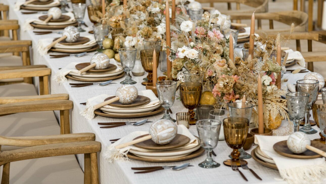 decorated dining table set for a wedding.