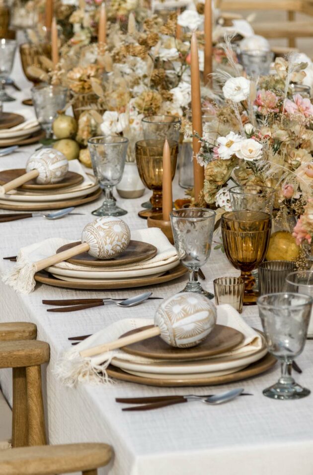 decorated dining table set for a wedding.