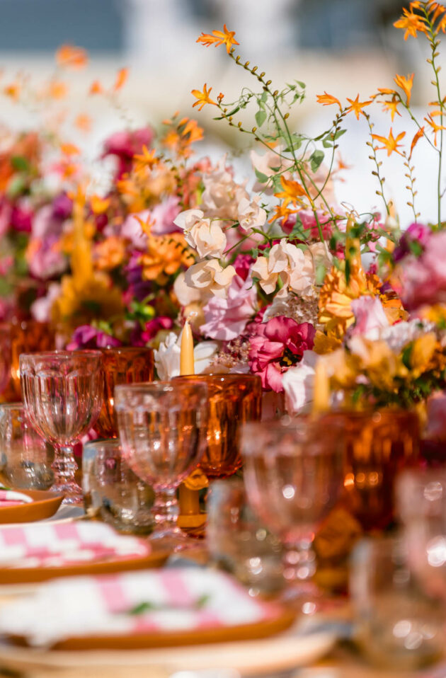 floral arrangements on a decorated dining table.
