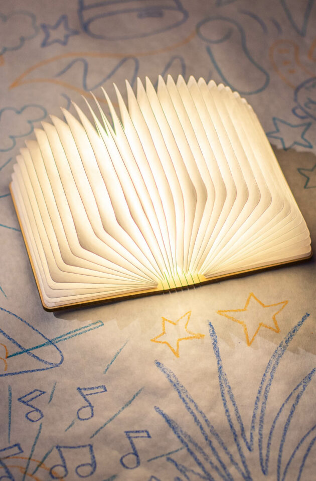 light centerpiece that looks like an open book with the pages fanning out.