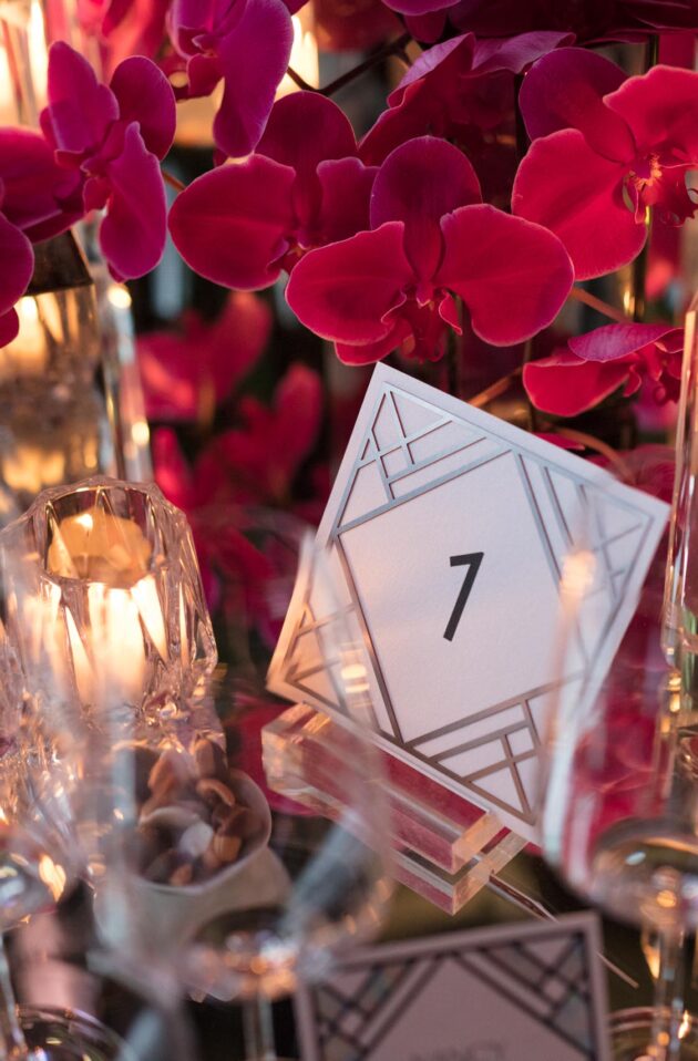 number one on a place card in a decorative place setting.