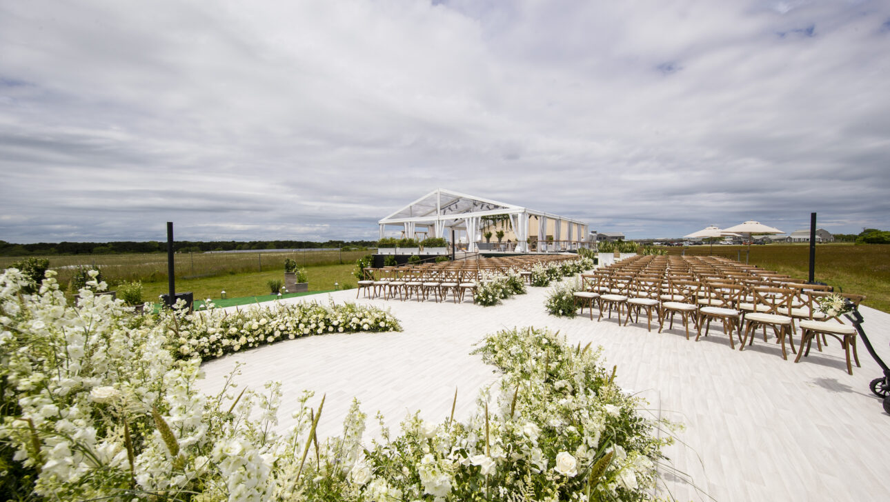Beach wedding ceremony. Designed by Rafanelli Events.