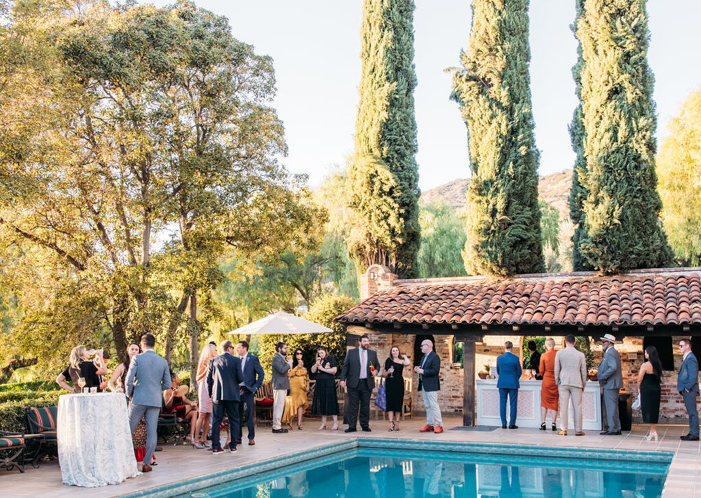 Poolside cocktail hour. Destination wedding Designed by Rafanelli Events.