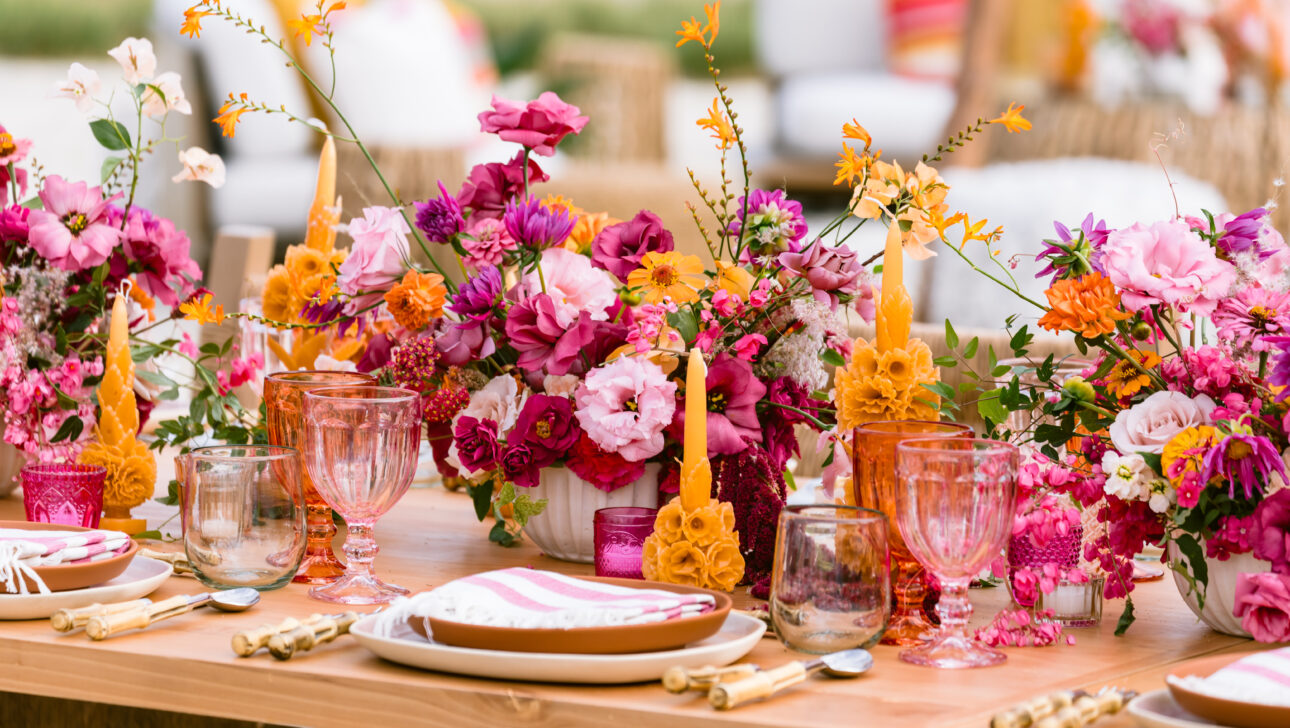 Stunning colorful tablescape for destination wedding designed by Rafanelli Events.